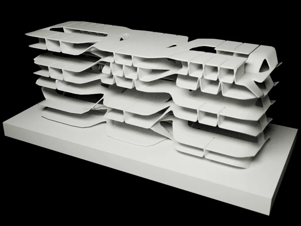 Photograph of a white model of the high-rise: stacked, branching floor plates on a base