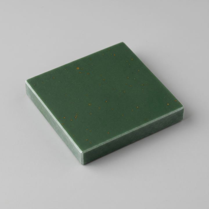 Rendered sample plate of Ca₁₂Cr₃Fe₅O₄₈Si₁₂