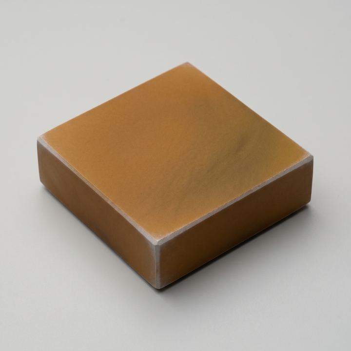 Rendered sample plate of Ca₁₂Fe₅O₄₈Si₁₂V₃