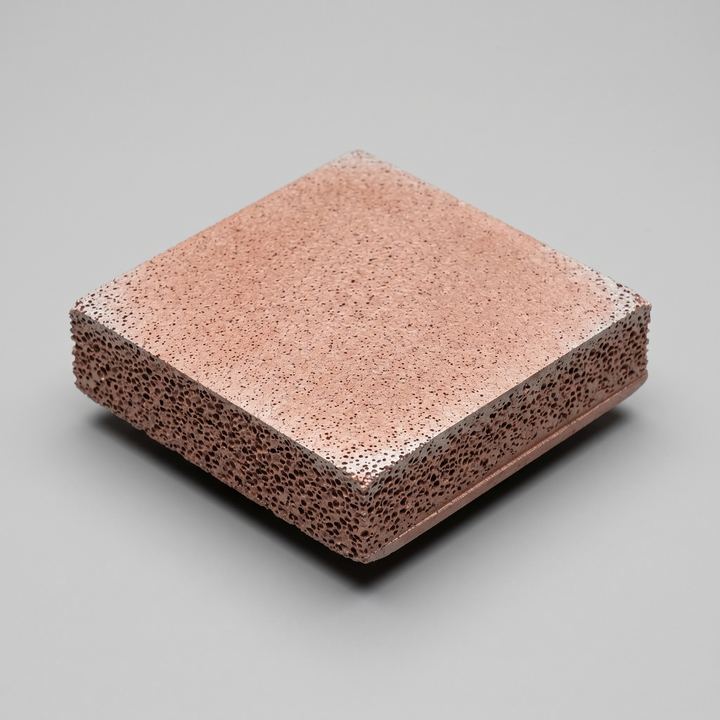 Rendered sample plate of CoCu₃Er₄Mg₂